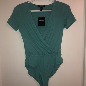 Forever 21 NWT blue bodysuit low cut